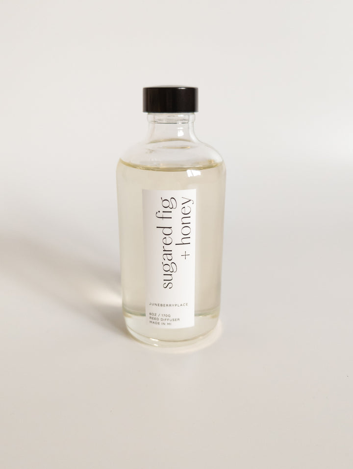 Sugared Fig and Honey reed diffuser: Winter Collection.  Modern clear glass, non-toxic formula. For home fragrance fans who love a clean aesthetic