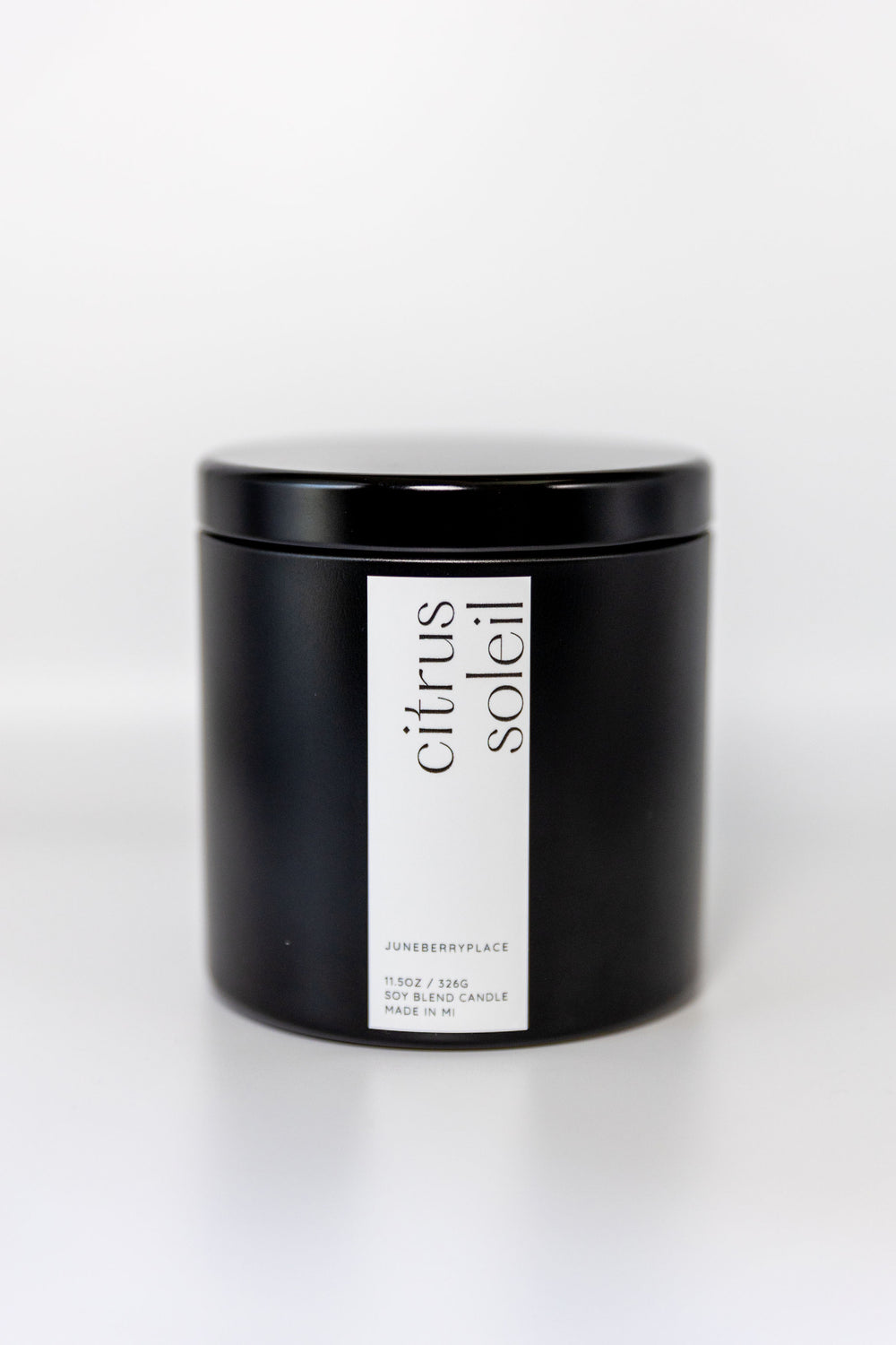 Citrus Soleil Wood Wick Soy Candle in matte black vessel by juneberryplace home fragrances
