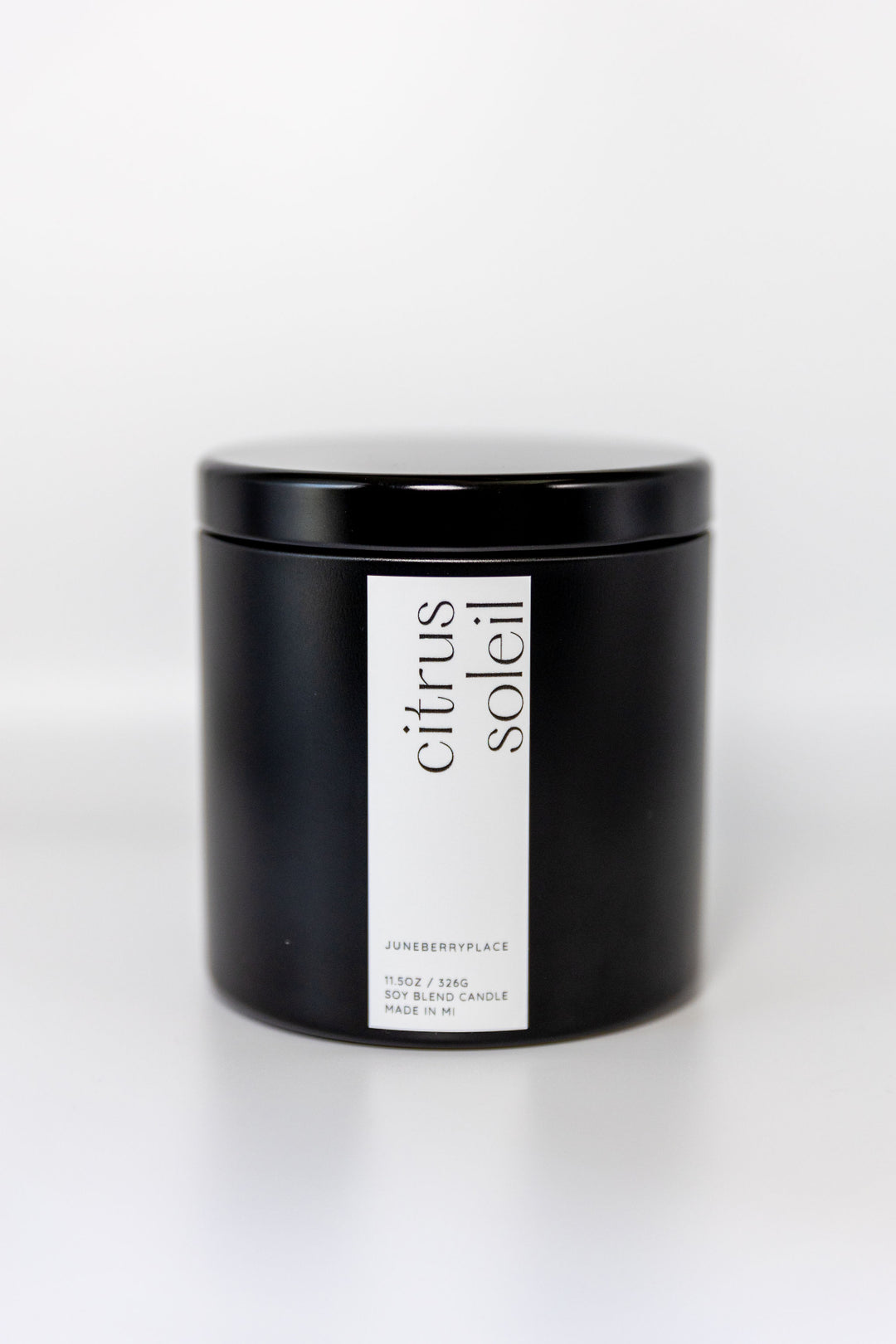 Citrus Soleil Wood Wick Soy Candle in matte black vessel by juneberryplace home fragrances
