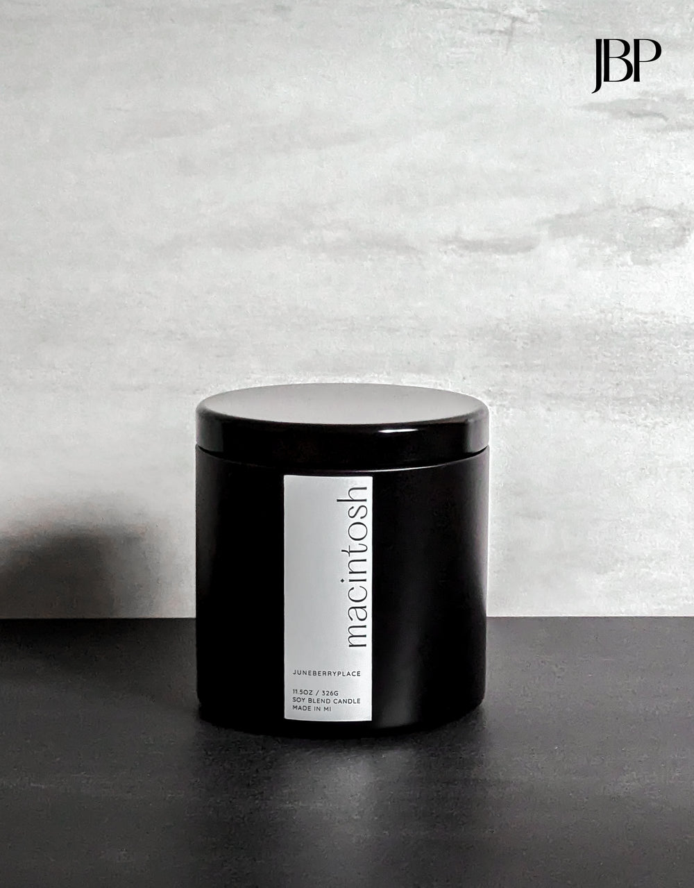 Macintosh Wood Wick Soy Candle in matte black vessel by juneberryplace home fragrances
