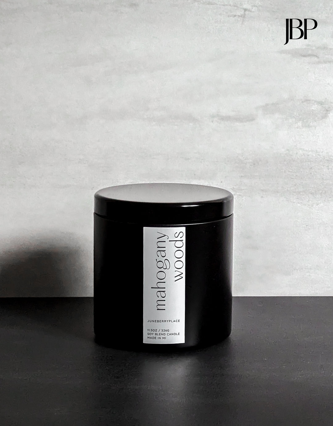 Mahogany Woods Wood Wick Soy Candle in matte black vessel by juneberryplace home fragrances