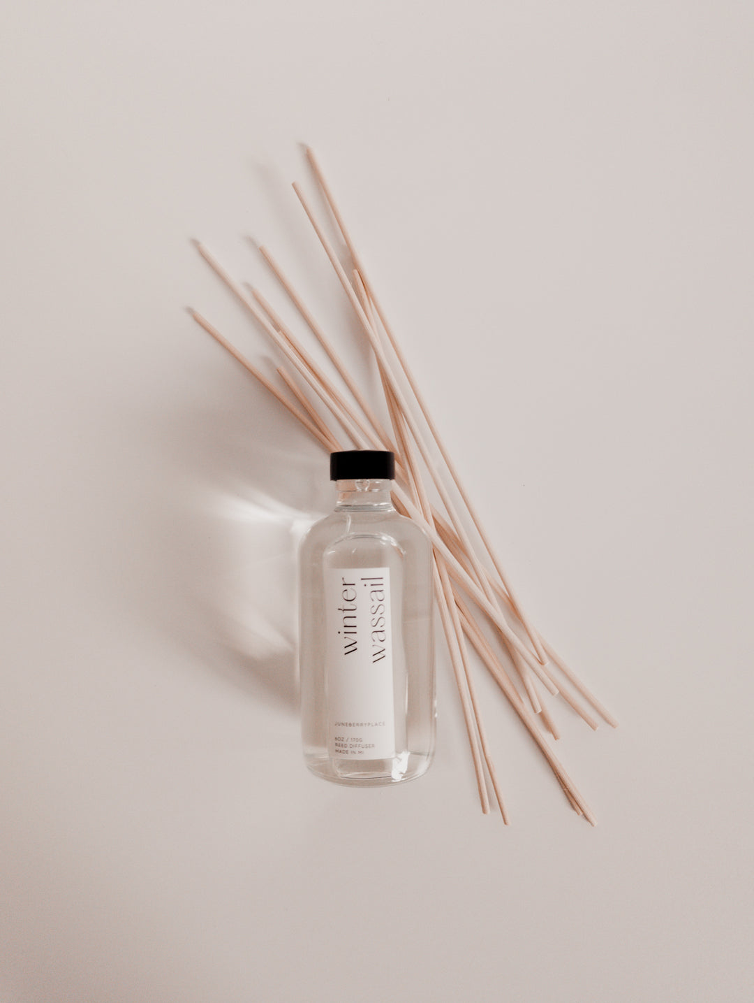 Winter Wassail reed diffuser: Winter Collection.  Modern clear glass, non-toxic formula. For home fragrance fans who love a clean aesthetic