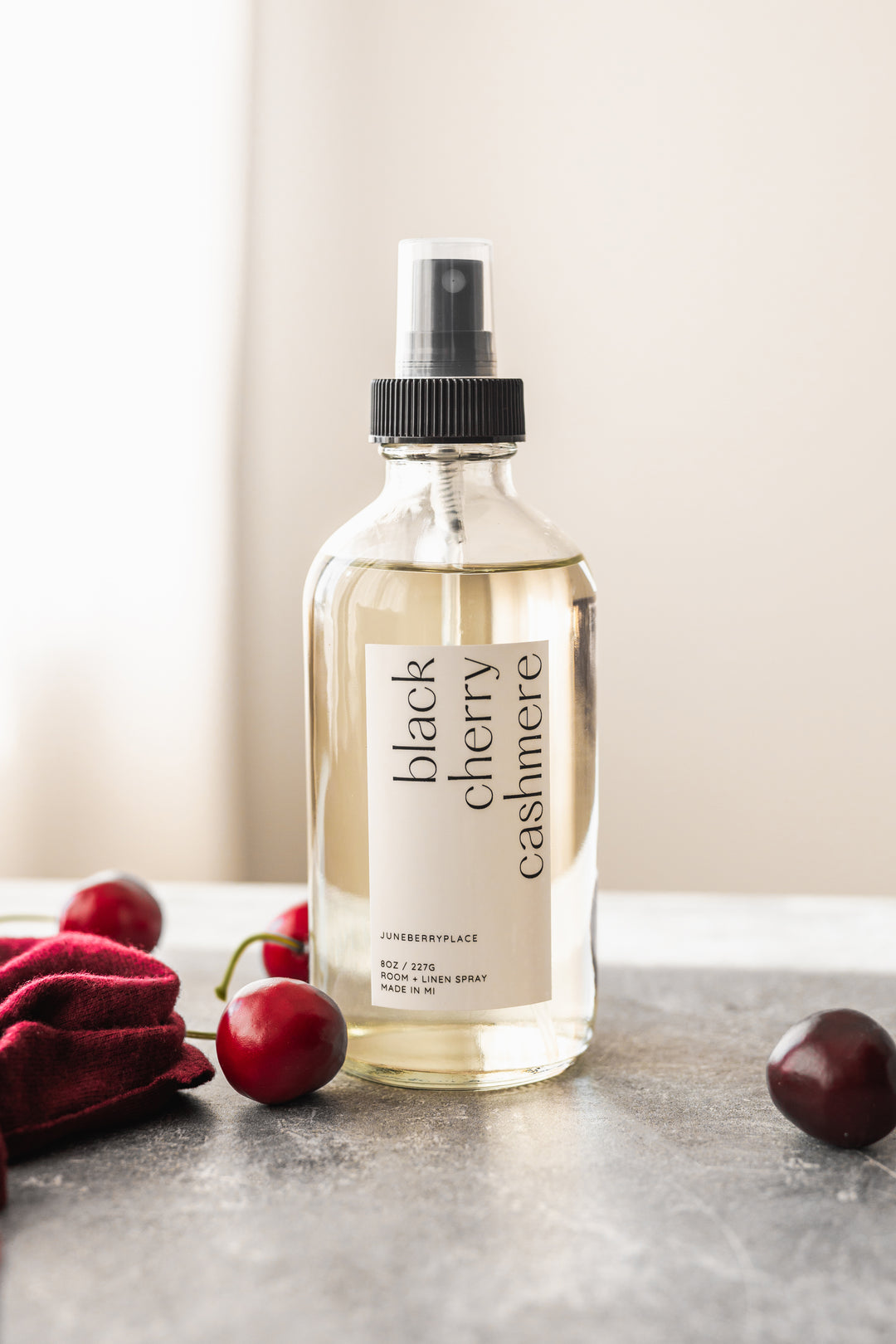 Black Cherry Cashmere Room and Linen Spray in clear glass spray bottle by juneberryplace home fragrances