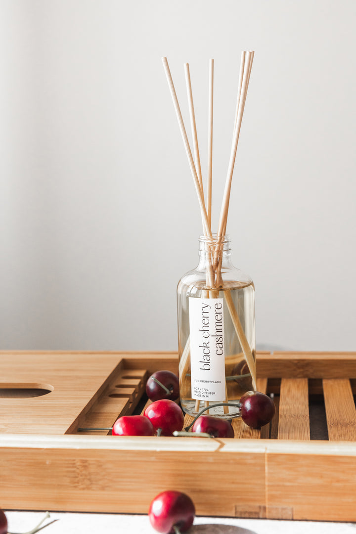 Black Cherry Cashmere Reed Diffuser in clear glass bottle with reeds by juneberryplace home fragrances