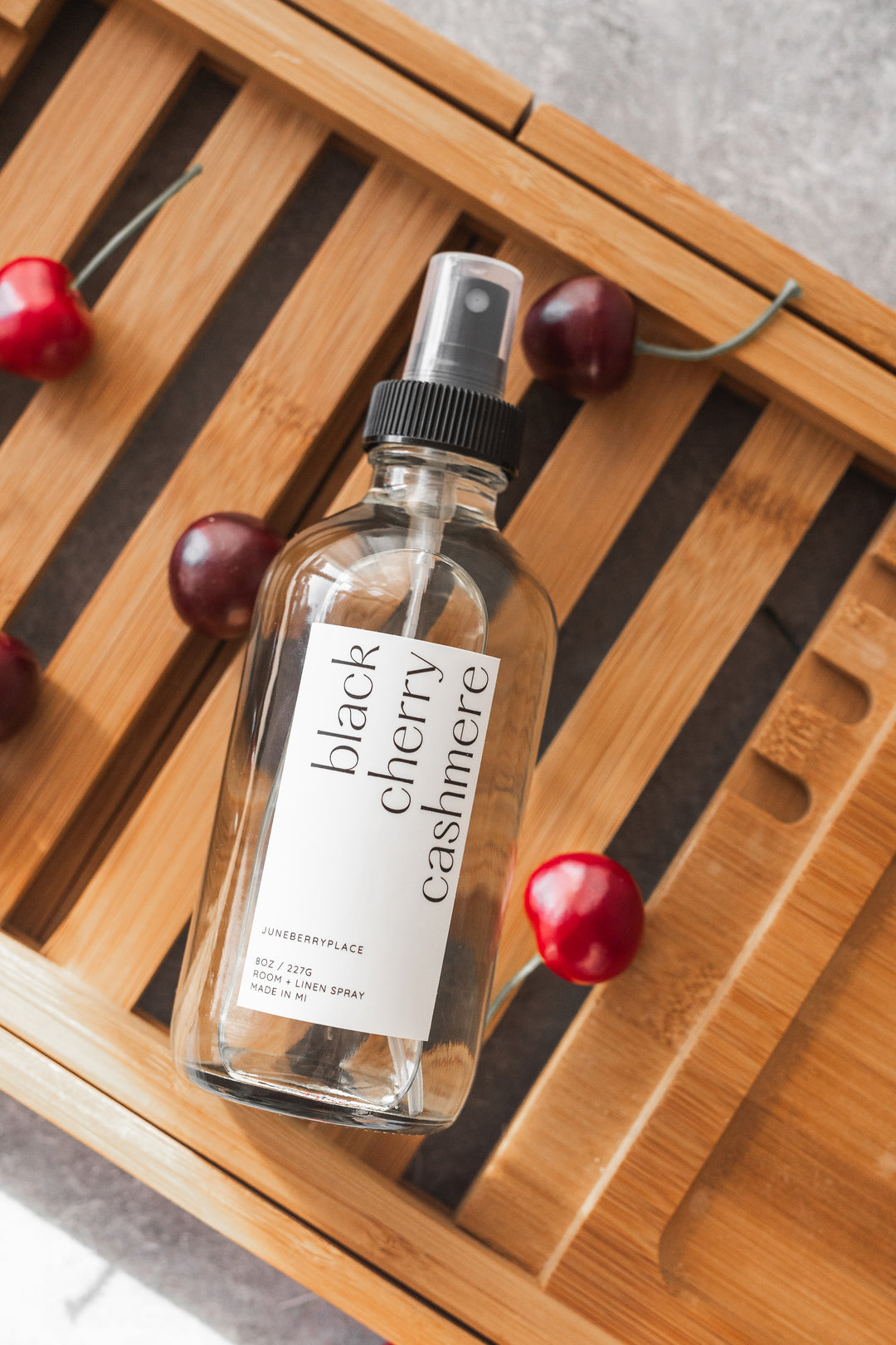 Black Cherry Cashmere Room and Linen Spray in clear glass spray bottle by juneberryplace home fragrances
