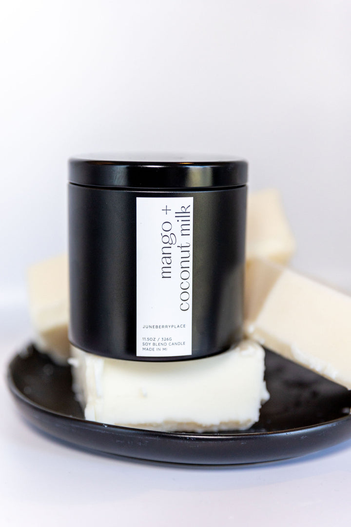 Mango and Coconut Milk Soy Candle in matte black vessel by juneberryplace home fragrances