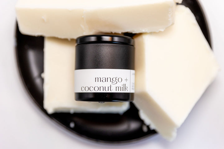 Mango and Coconut Milk Soy Candle in matte black vessel by juneberryplace home fragrances