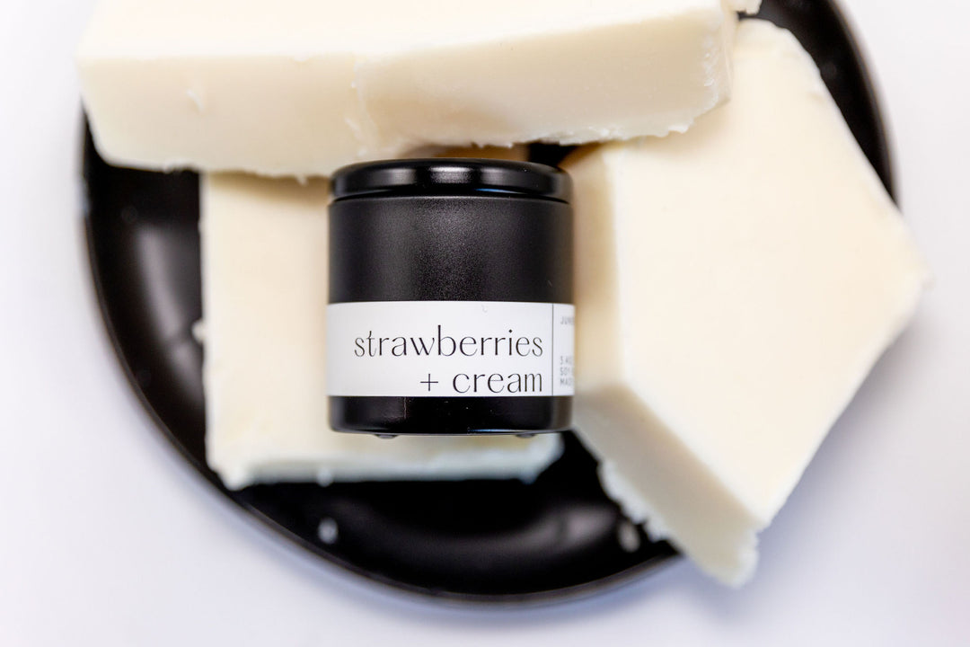 Strawberries and Cream Soy Candle in matte black vessel by juneberryplace home fragrances