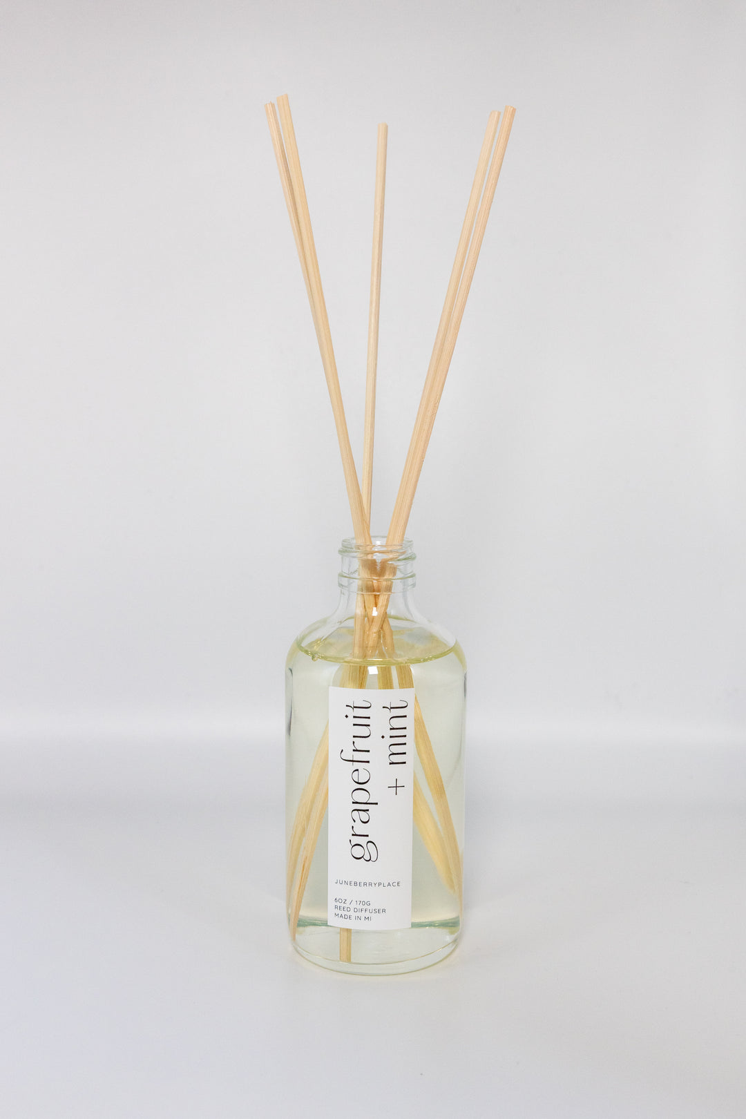 Grapefruit and Mint Reed Diffuser - Spring Collection in a glass bottle by juneberryplace home fragrances